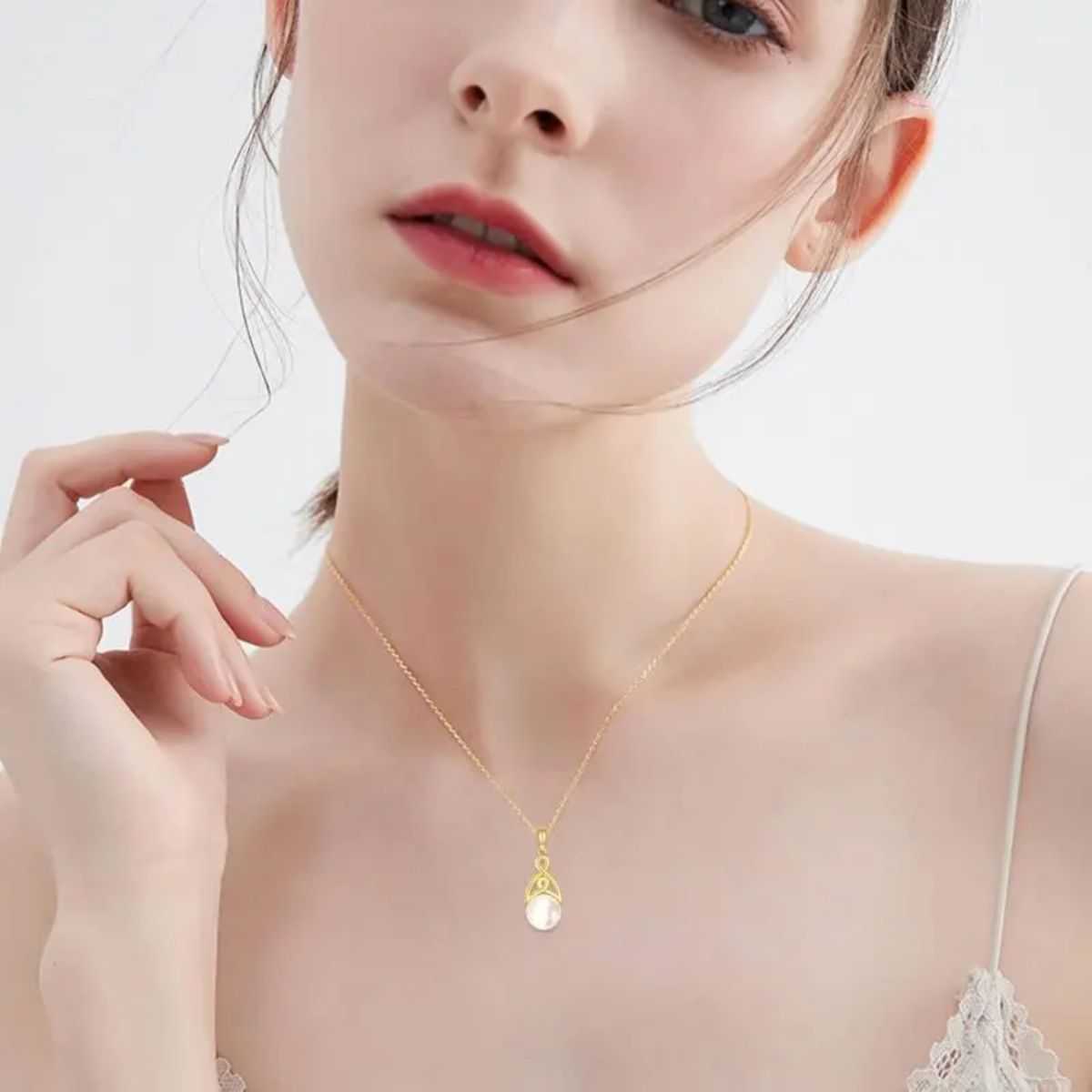 14K gold pearl necklace with Celtic knot pendant
