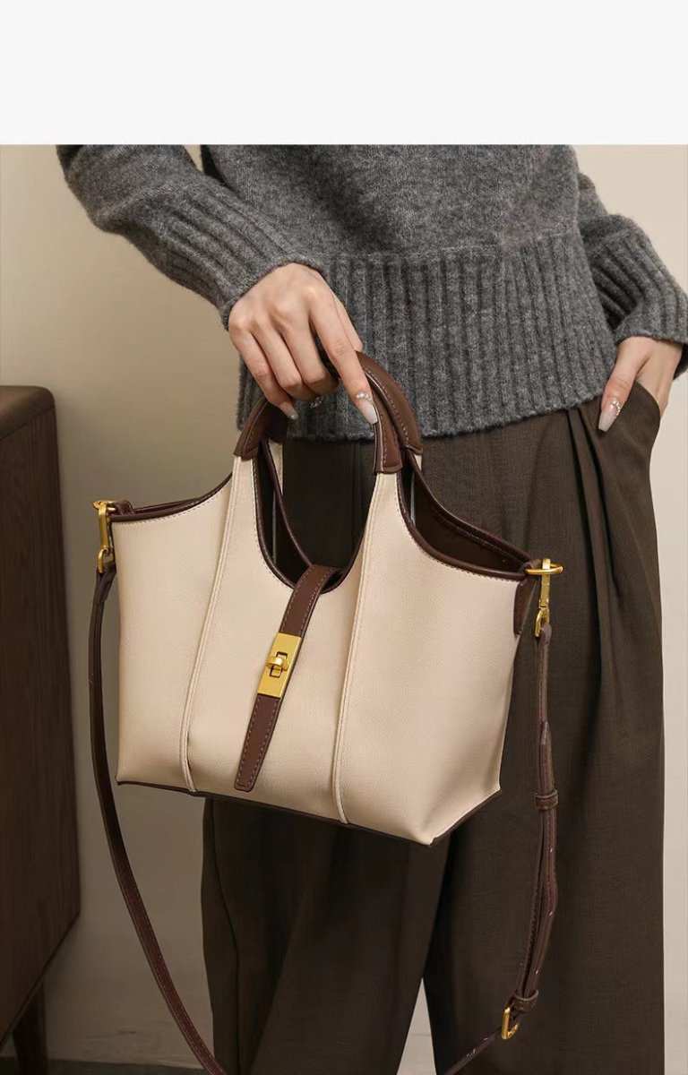 Chic crossbody purse with adjustable strap, displayed against urban-inspired props for versatile styling