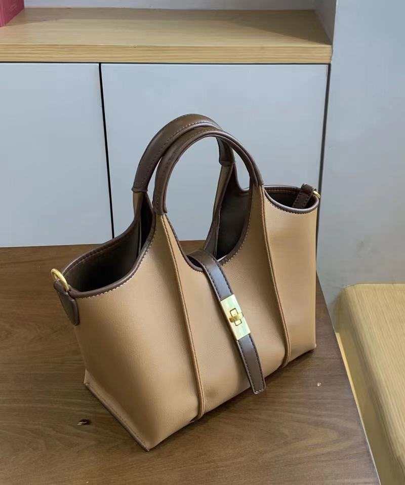 Timeless luxury crossbody bag for women, shown styled with formal outfit for work or event