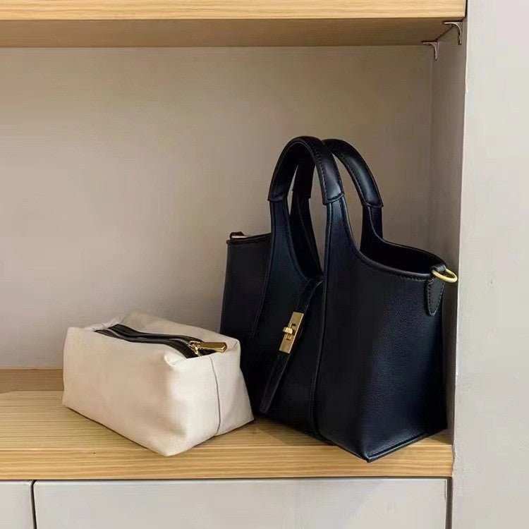 Urban luxury crossbody bag, interior pocket layout shown with essentials like phone and wallet inside