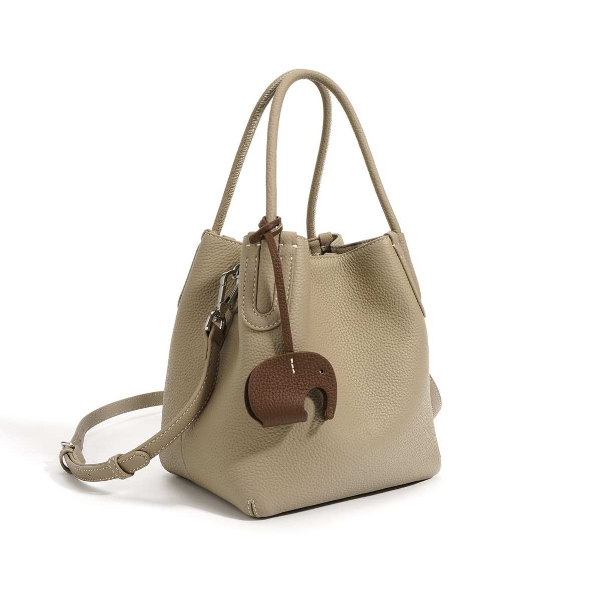 Chic Leather Handheld Crossbody Bag shown next to daily essentials for size comparison