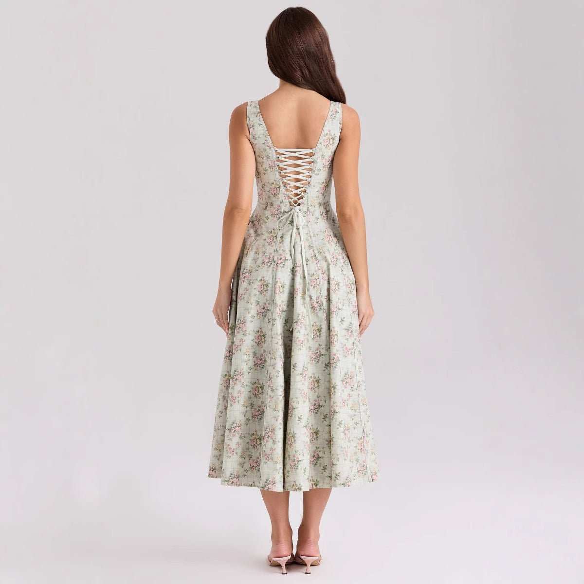 Chic strapless summer dress, floral print, modeled outdoors, polyester blend fabric