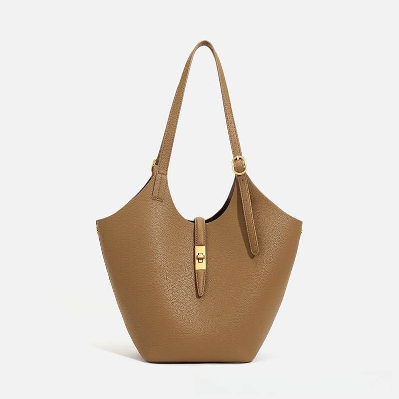 Timeless women’s tote standing upright, wide base for stability and large capacity