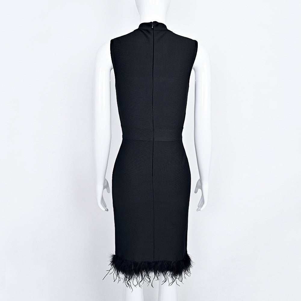 Back view, feather gown with rhinestone waist and hidden zipper, formal attire