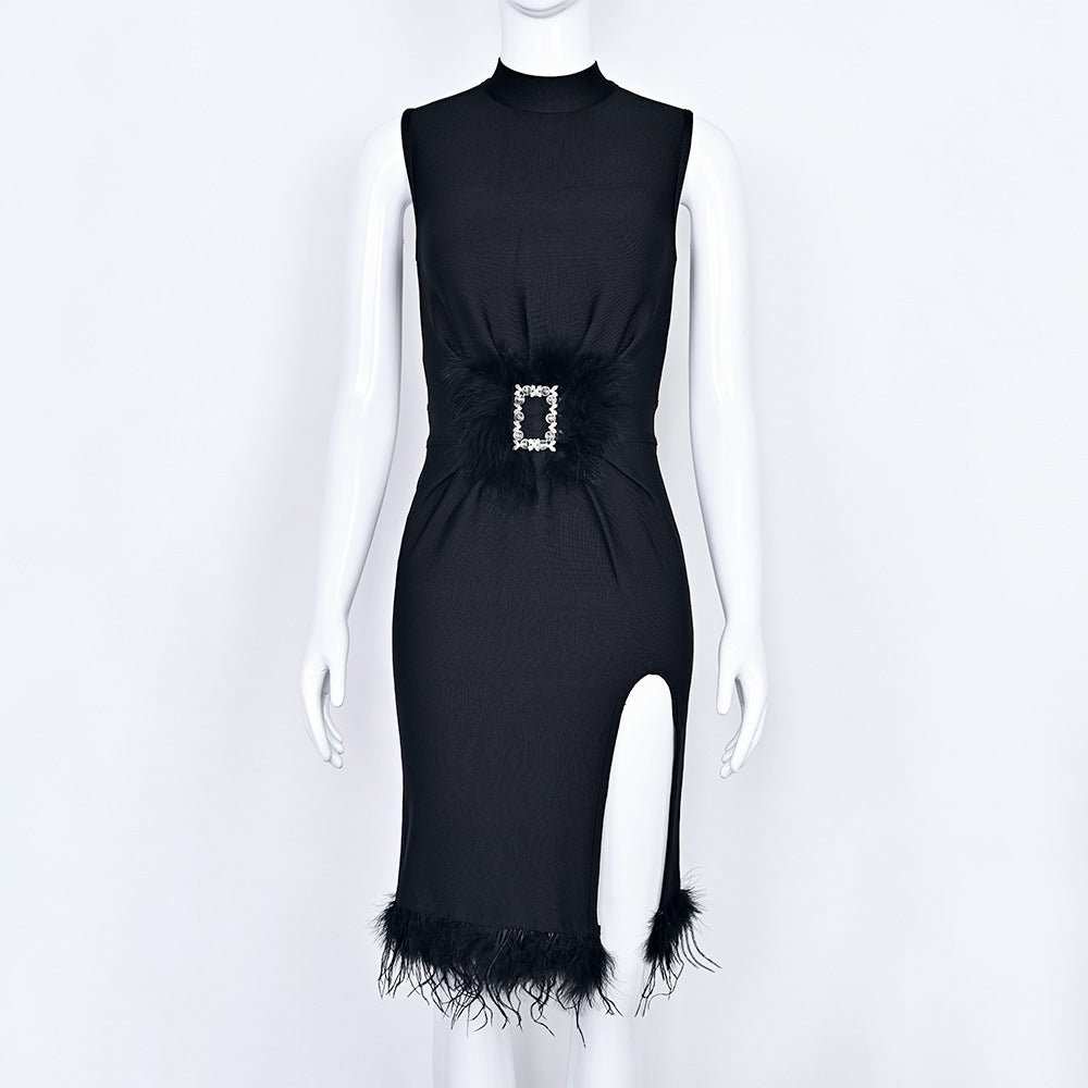 Detailed close-up of feathered shoulder and rhinestone trim on black evening dress