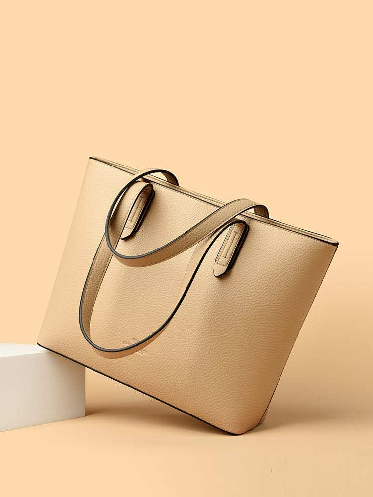 PU Leather Tote Bag for women with structured base, slip pockets and laptop compartment shown open