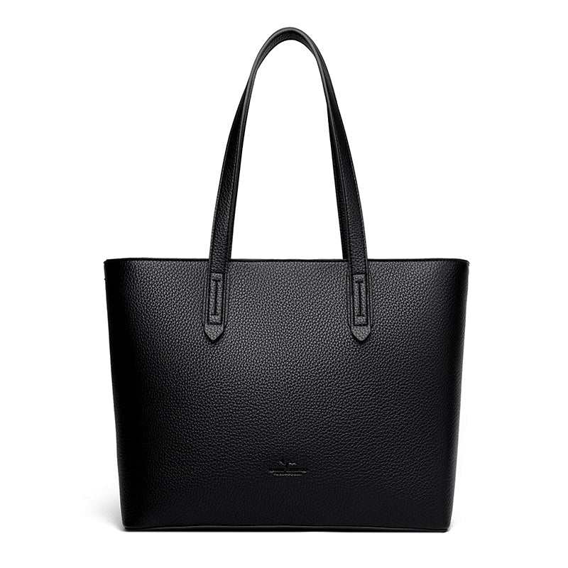 PU leather handbag, lightweight, with multiple interior organization pockets and secure top zip