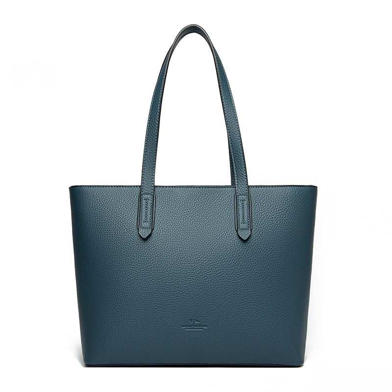PU leather work tote for women, minimalist design with subtle stitching details, fashion-forward accessory