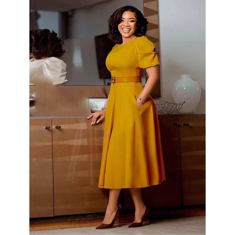 Lightweight spring and summer A-line day dress for women showing relaxed waist and drape