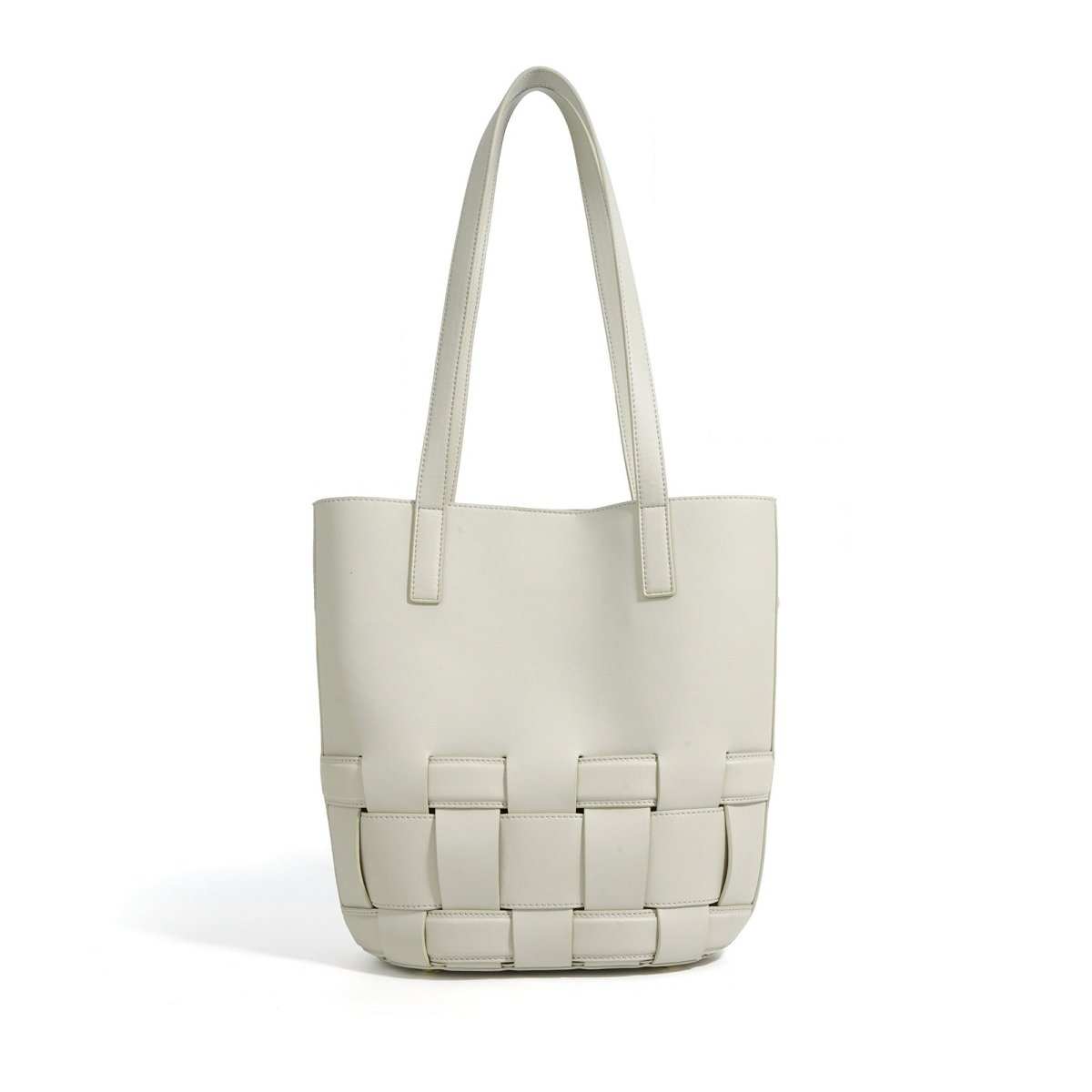 Elegant cowhide leather tote bag styled for daily use, emphasizing durability and functional elegance