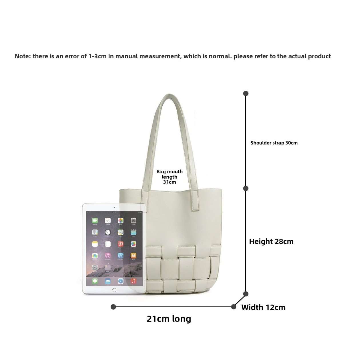 Versatile woven leather tote bag displayed with fashionable outfit for day-to-evening wear