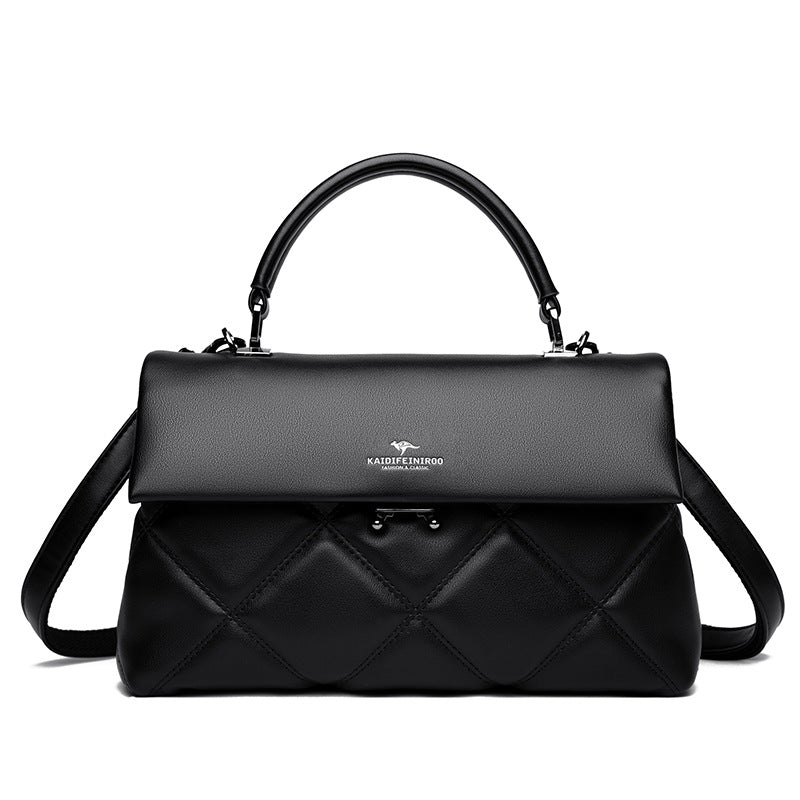 PU Leather crossbody handbag with adjustable strap, shown on model for scale and urban fit