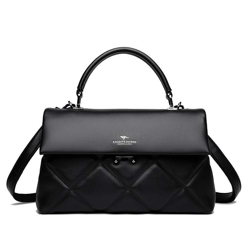PU Leather crossbody handbag with adjustable strap, shown on model for scale and urban fit