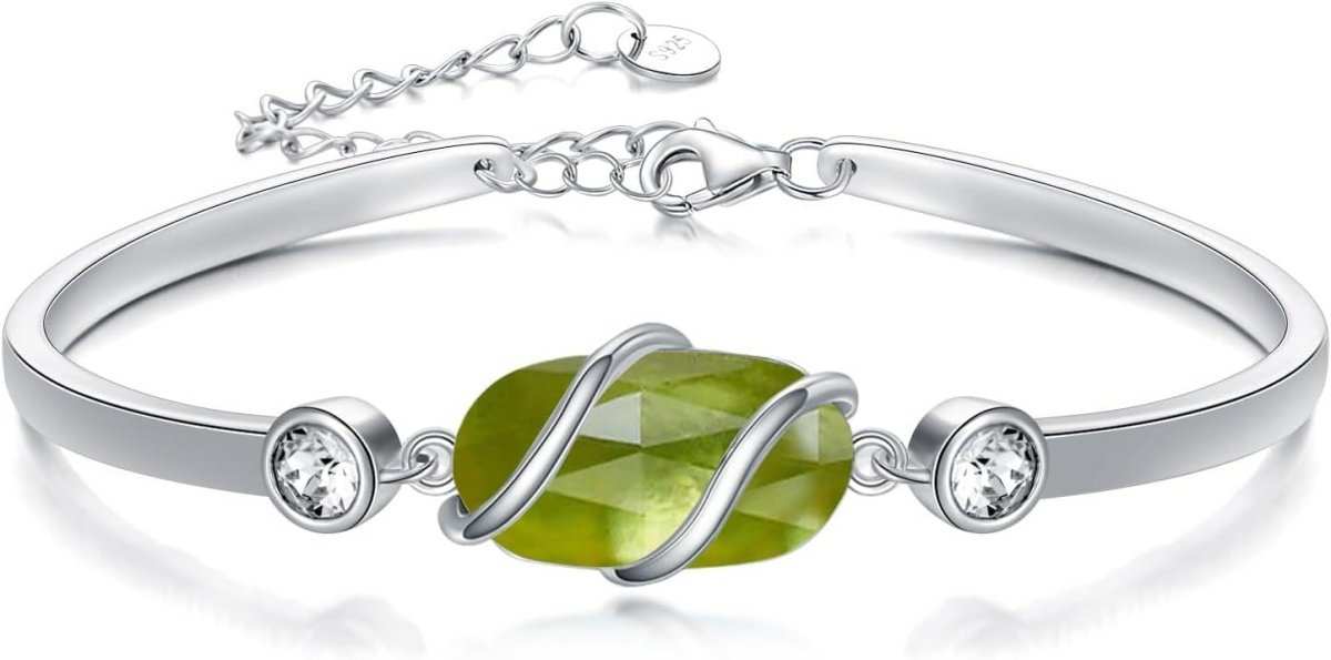 925 sterling silver open-cuff bangle with natural green malachite stone, angled close-up