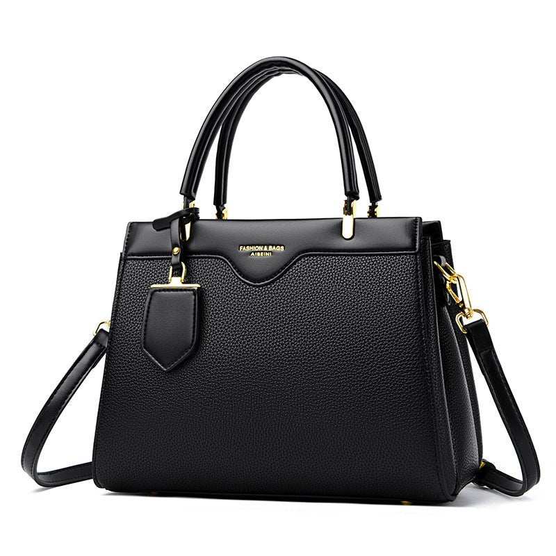 Elegant messenger bag for everyday use, close-up of hardware and stitching accents