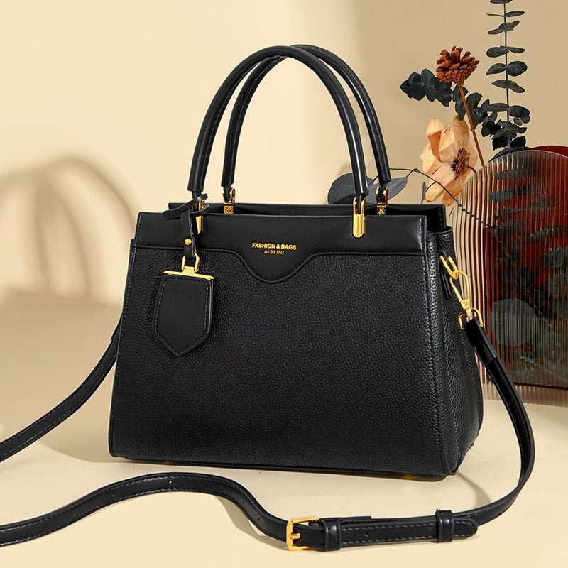 Light luxury messenger bag for women, shoulder strap detail, soft PU leather finish