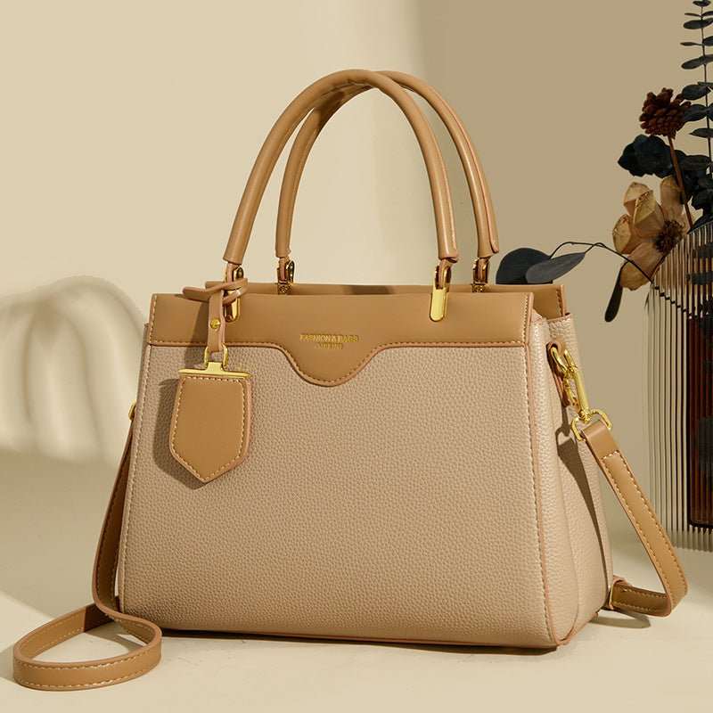 High-end light luxury PU messenger bag worn crossbody, styled for women’s daily outfits