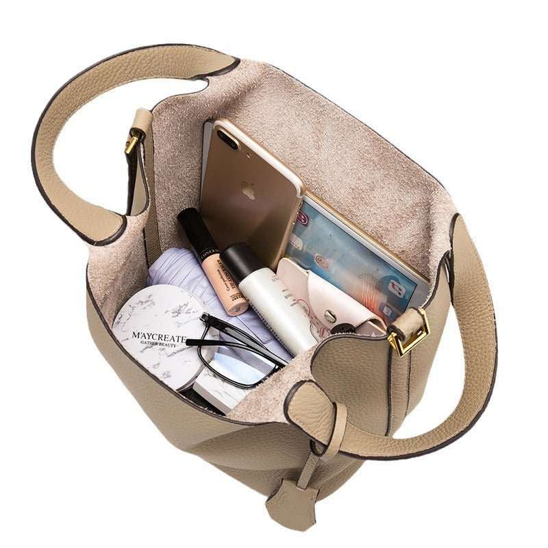Premium Leather Bucket Bag, shown with everyday essentials inside for size reference