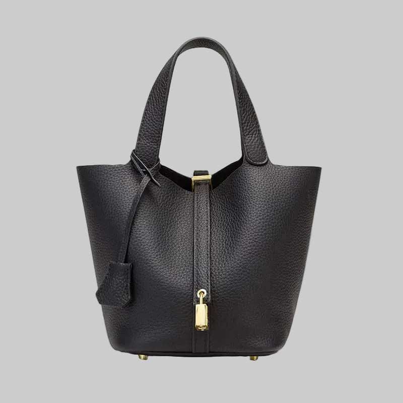 Genuine Leather Bucket Bag in classic silhouette with drawstring and magnetic closure, front view