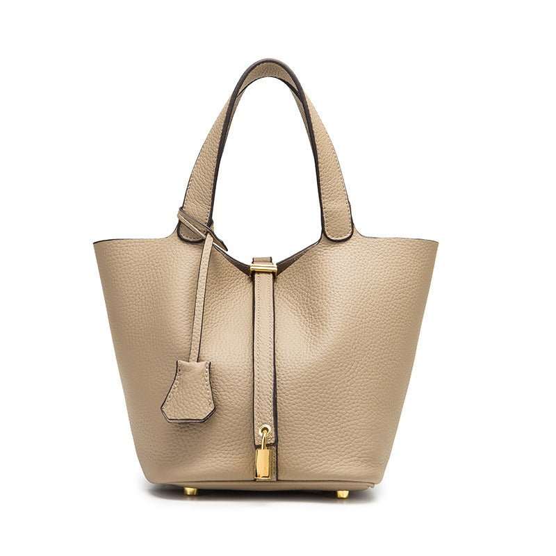 Premium Leather Bucket Bag, side profile showing adjustable shoulder strap
