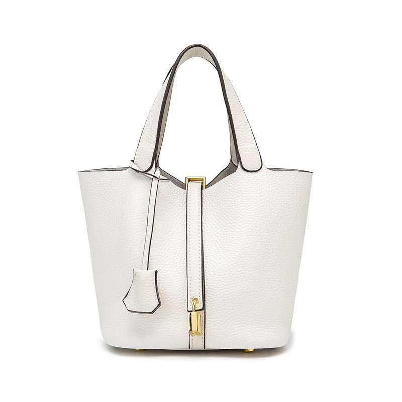 Classic Leather Bucket Bag, displayed with adjustable shoulder strap extended