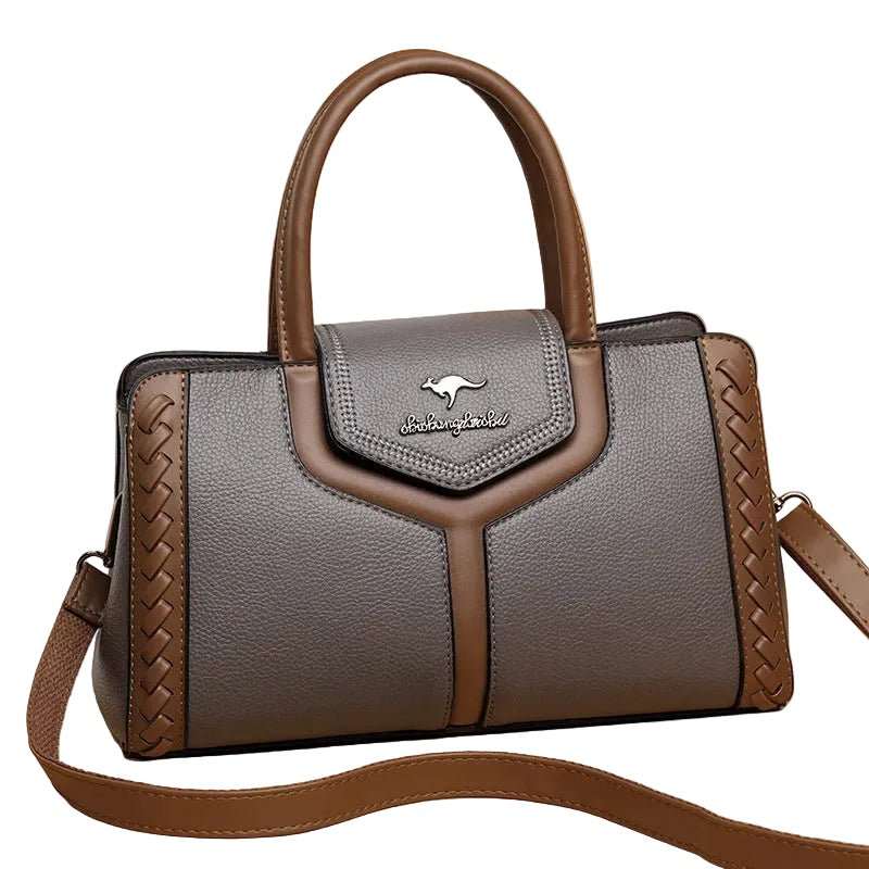 Organized crossbody bag for women, top view showing interior dividers and phone pocket