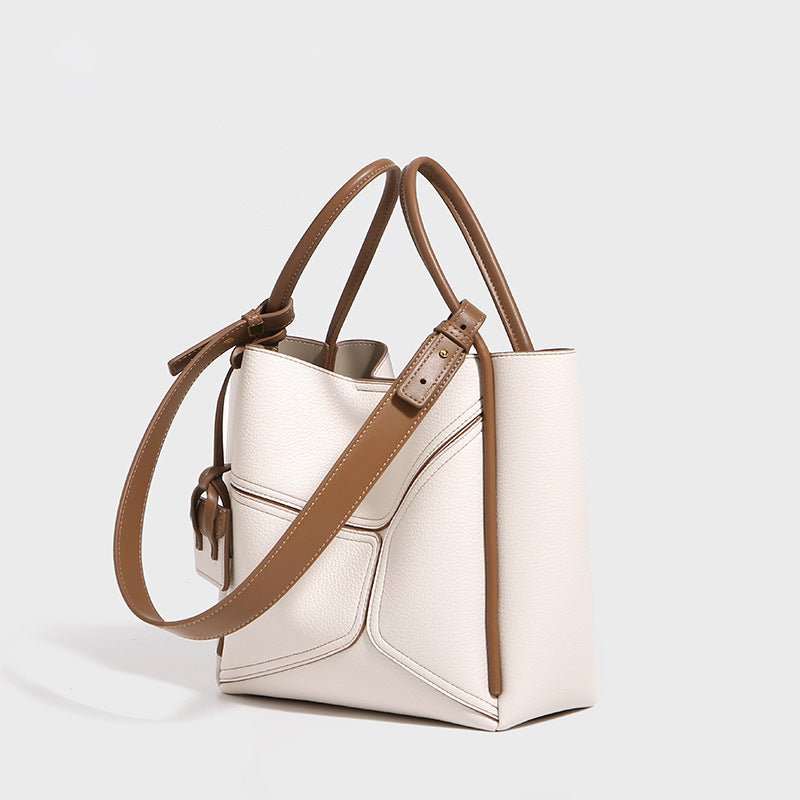 Urban Chic leather tote in oat beige, highlighting versatile design and comfortable double-stitched straps