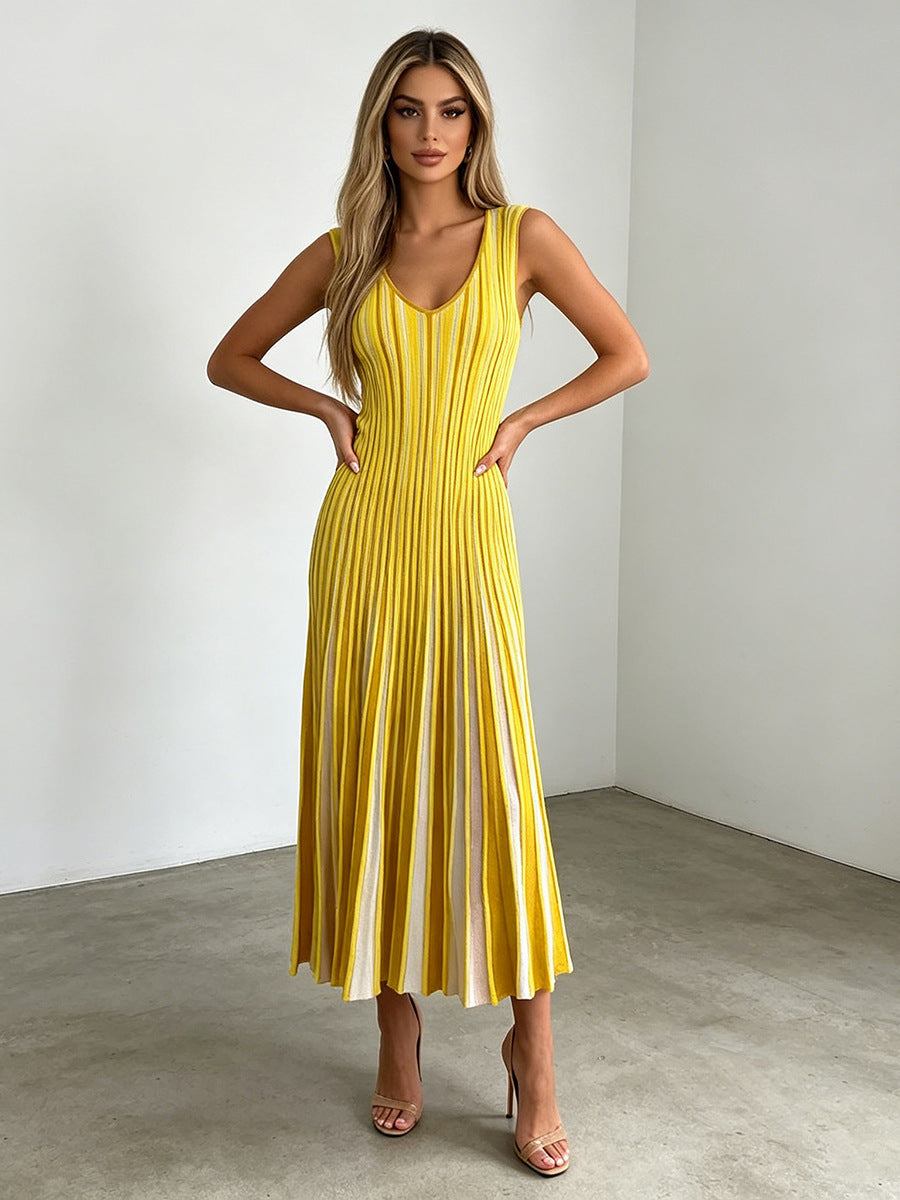 Chic Commuter Long Dress in vibrant yellow with vertical stripes, sleeveless V-neck and pleated long skirt made of polyester-cotton blend
