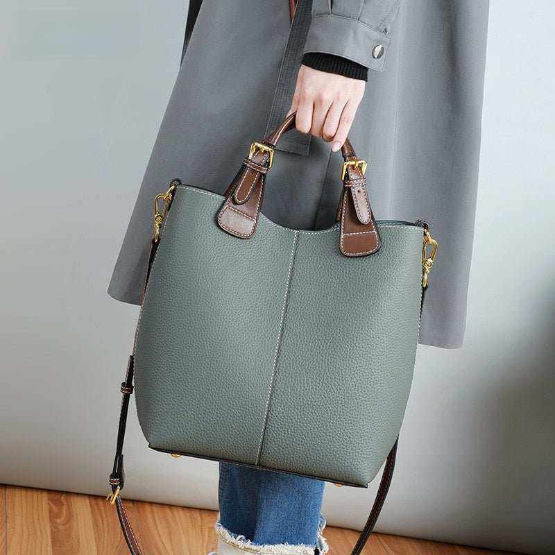 Large genuine leather crossbody bag for women in high-grade gray with brown handles and gold-tone hardware accents