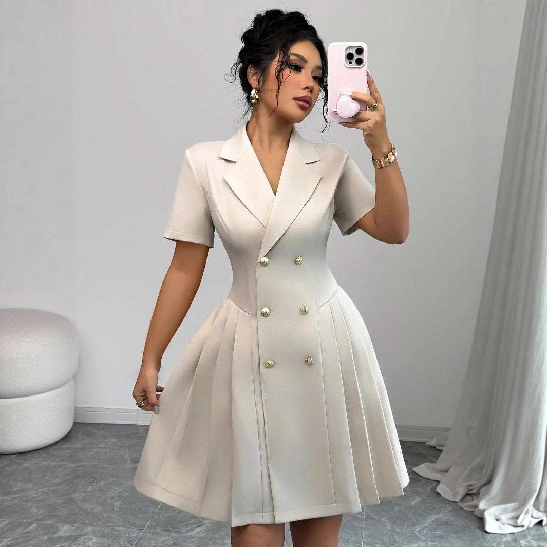 Double-Breasted Short Sleeve beige dress with a tailored high waist, pleated skirt, and gold buttons on front