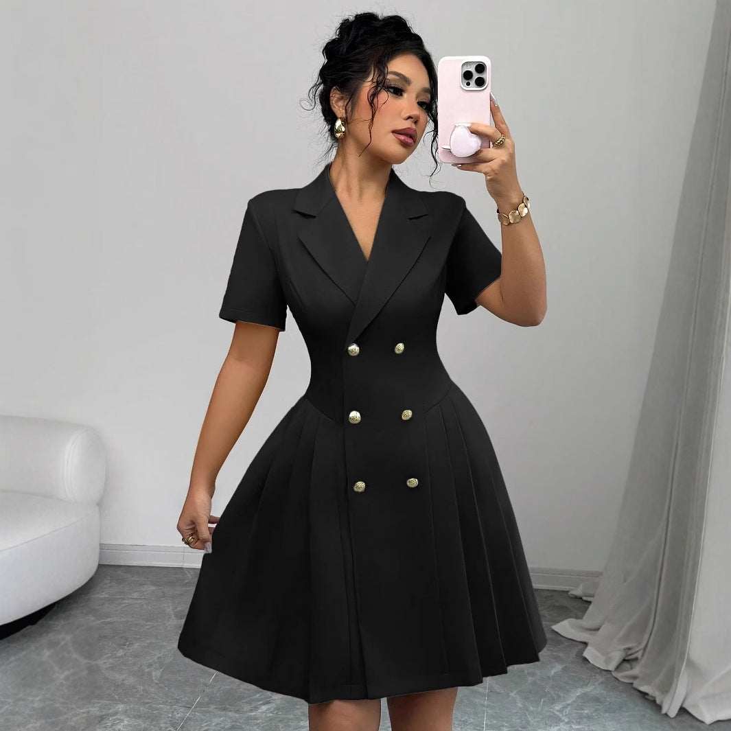 Black double-breasted short sleeve dress with gold buttons, tailored waist, and suit collar in smooth fabric