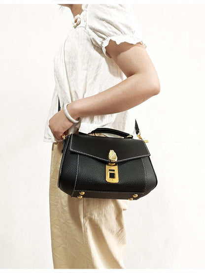 Luxury Anti-Theft Fingerprint Lock Shoulder Bag in black textured leather with structured flap and gold clasp