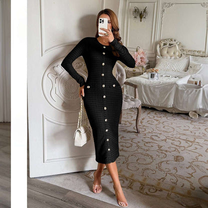 Woman wearing structured knit long-sleeve sweater dress in black