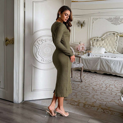 Woman wearing structured knit long-sleeve sweater dress in black