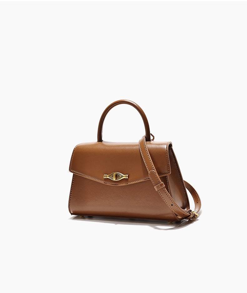 Vintage Metal Buckle brown synthetic leather crossbody handbag with top handle and structured flap design