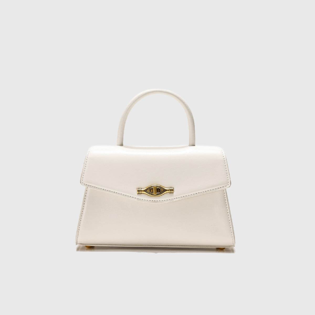 Vintage Metal Buckle cream white structured handbag with top handle, flap closure, and gold clasp