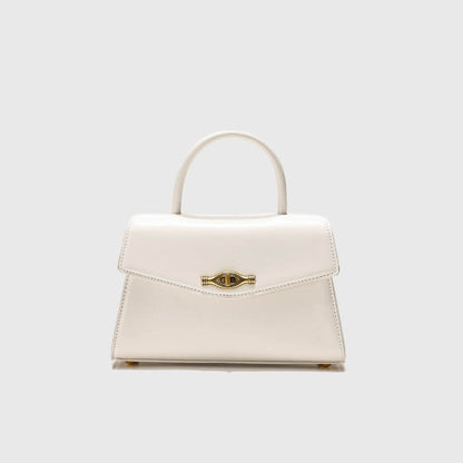 Vintage Metal Buckle cream white structured handbag with top handle, flap closure, and gold clasp