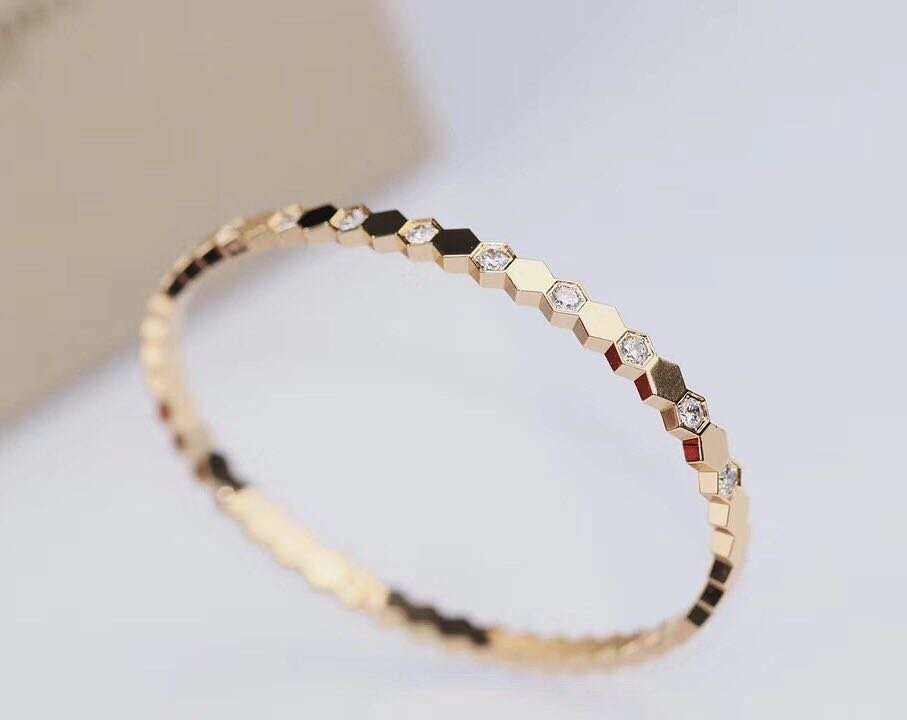 Sterling Silver Honeycomb Bracelet in gold tone with hexagonal links and small embedded clear crystals for elegant style