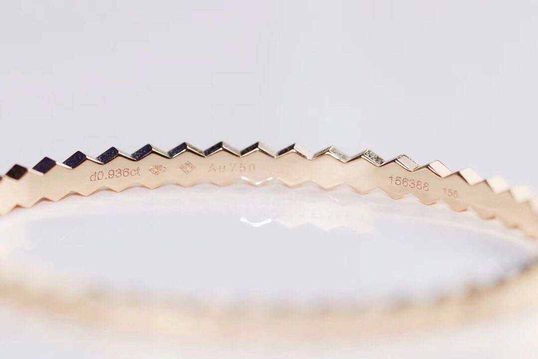 Sterling Silver Honeycomb Bracelet with a zigzag honeycomb pattern in gold electroplated metal, showcasing delicate engraved markings