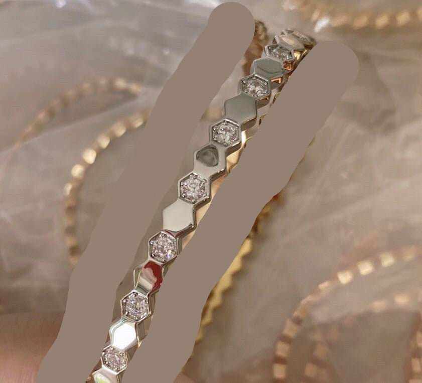 Sterling Silver Honeycomb Bracelet featuring hexagonal segments with embedded sparkling stones and polished silver finish